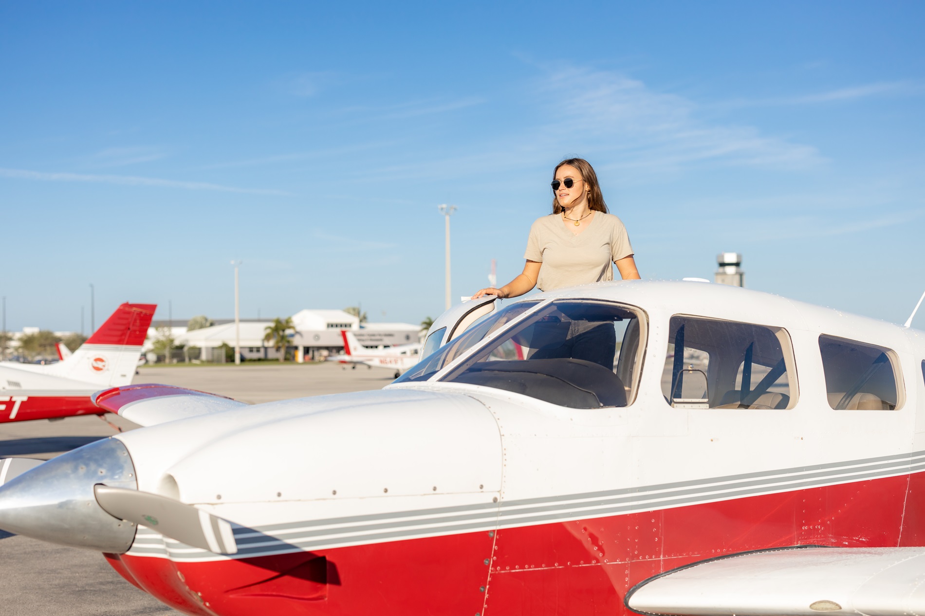 A flight student getting into a plane