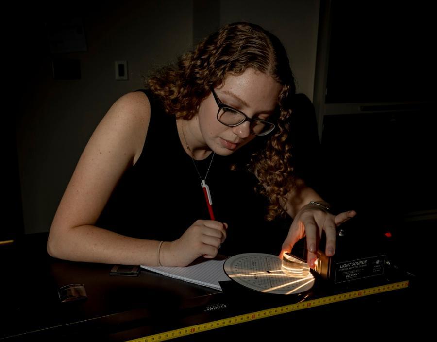 Student working in the optics lab