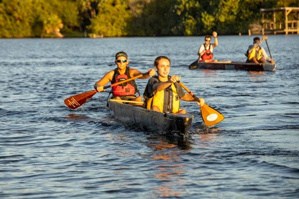 Students paddling concrete canoes they made as part of an ASCE competition