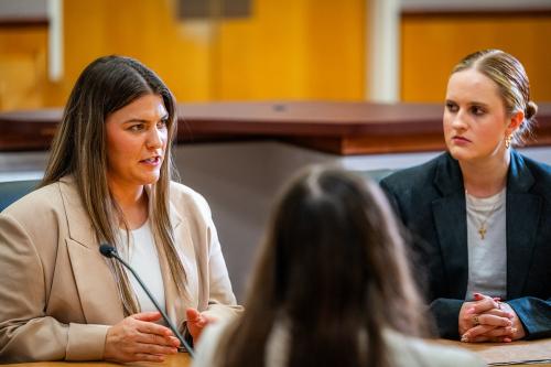Student discussion in a courtroom